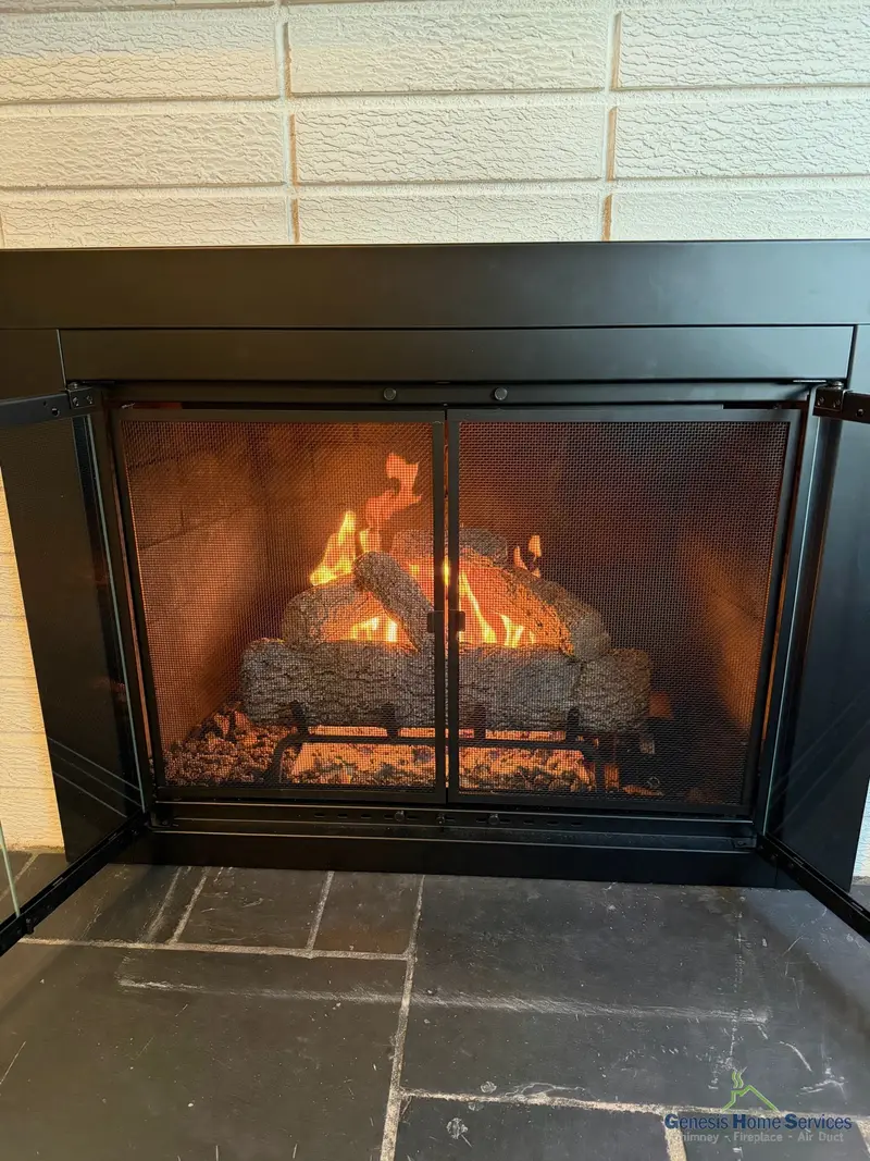 Linear gas fireplace installation with glass fire rocks Seattle