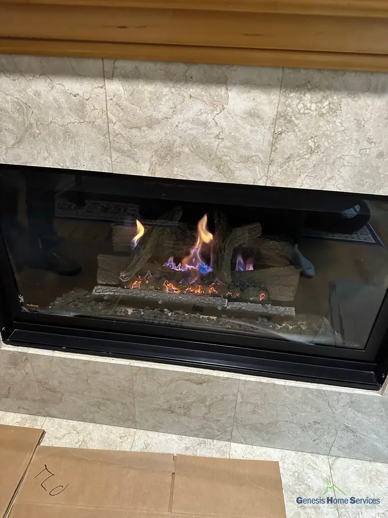 Gas fireplace installation with marble surround and log set Seattle