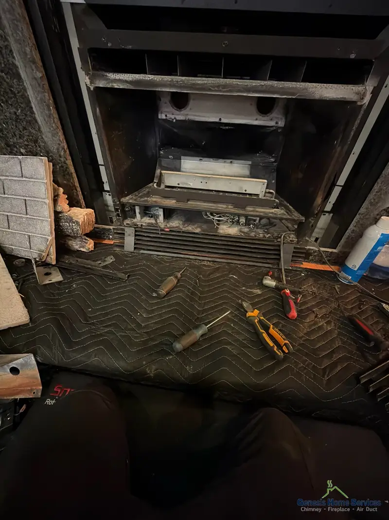 Gas fireplace insert disassembled during repair service Seattle