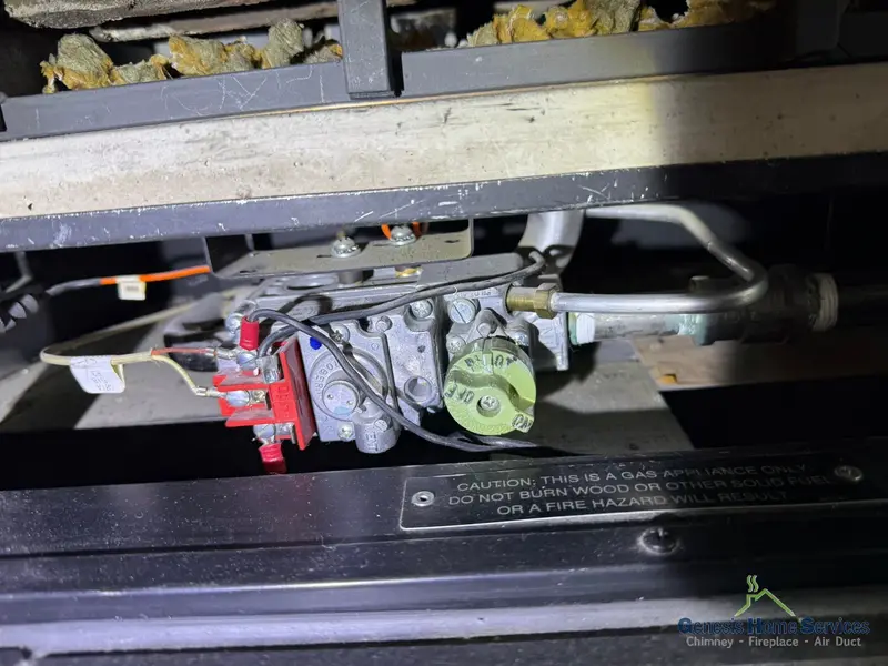 Gas fireplace valve assembly closeup during repair service