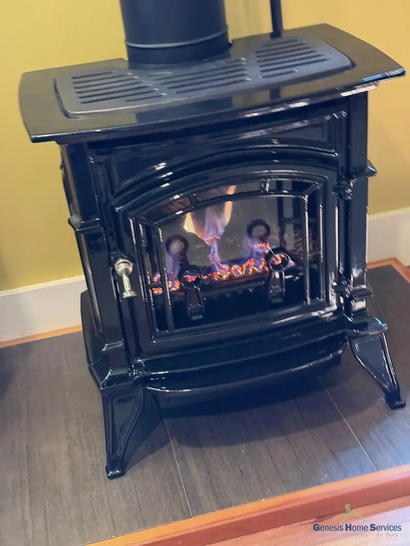 Gas fireplace cast iron stove lit — Redmond