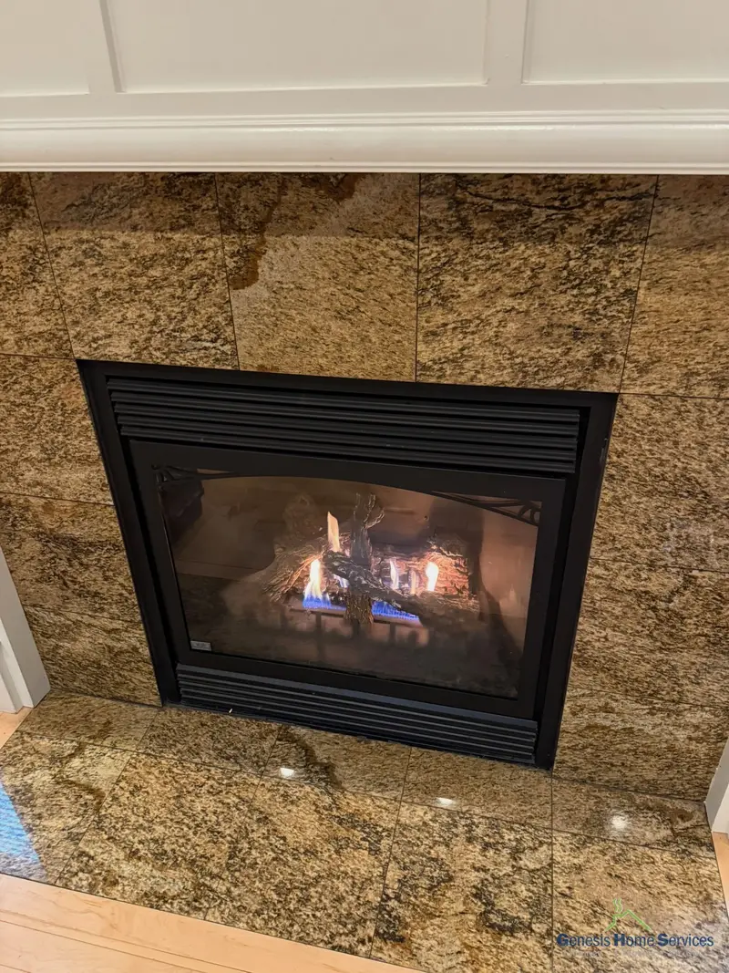 Gas fireplace granite surround burning — Bellevue