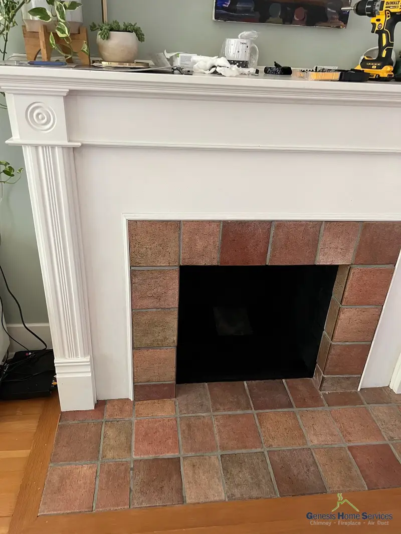 Gas fireplace white mantel terracotta tile surround — Federal Way